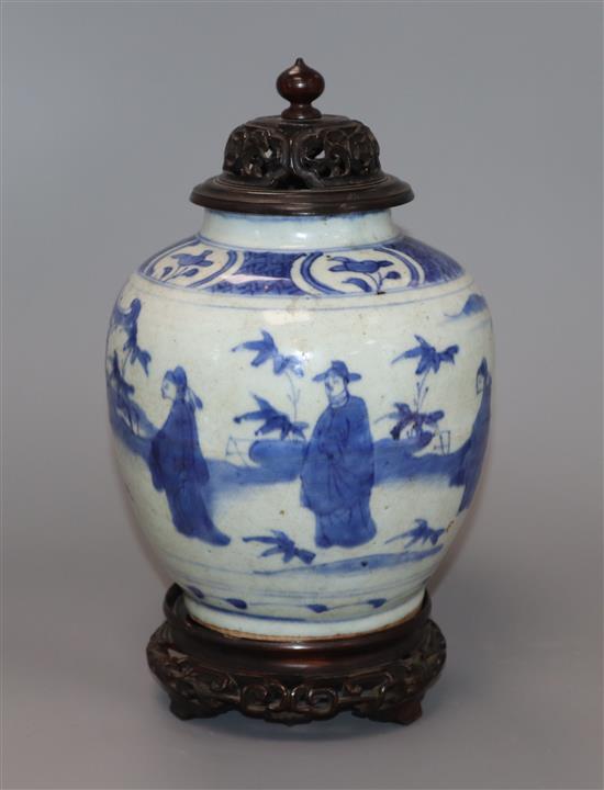 A Chinese Ming blue and white jar, Wanli period, hare mark, with hardwood stand and cover height excl. stand and cover 17cm